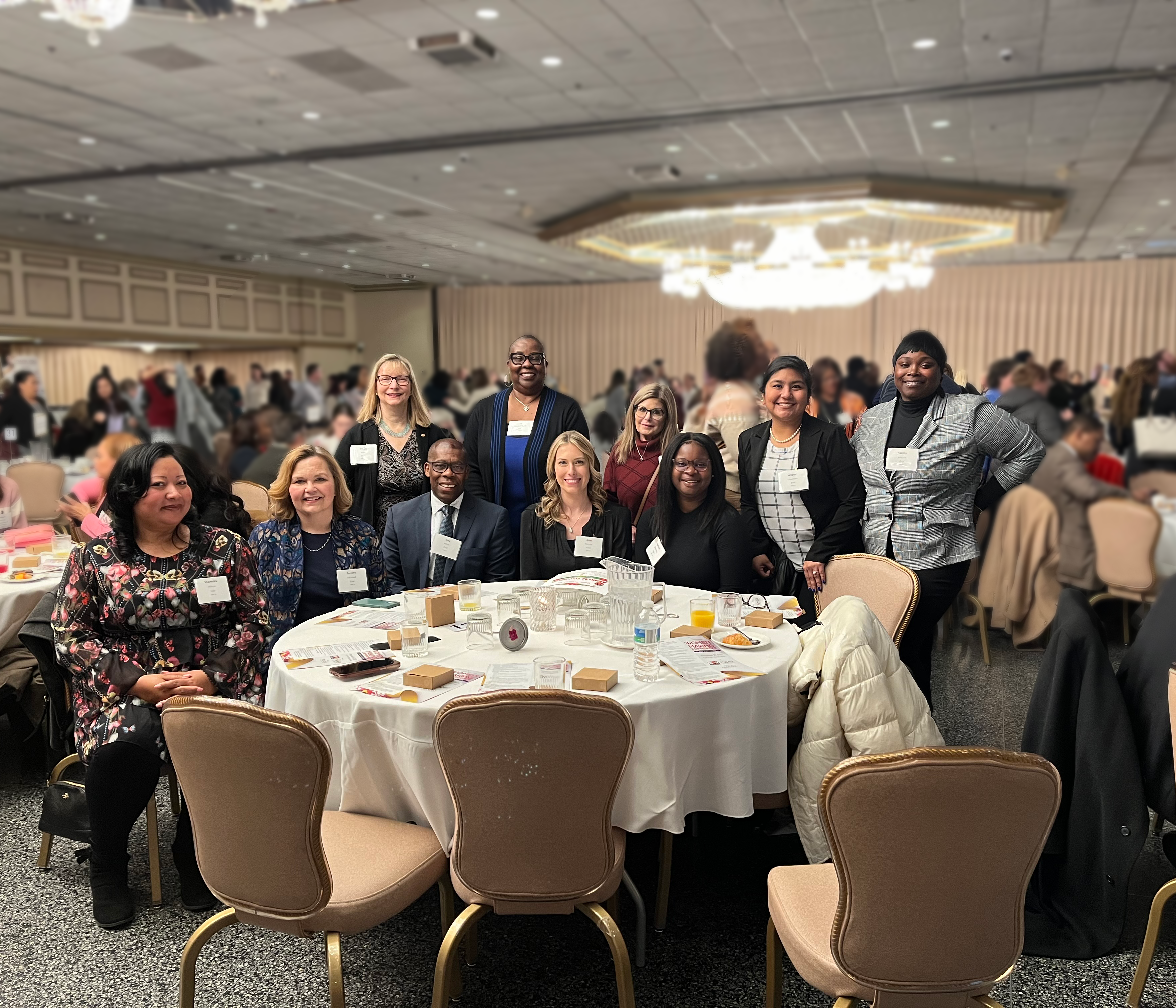 A photo of Trudy T. Burke with the other attendees at the Women Making a Difference for Maryland event